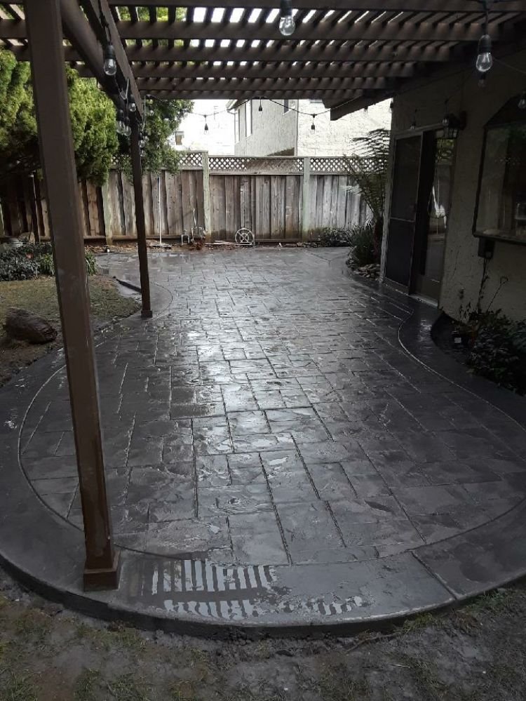 Backyard patio renovation with concrete