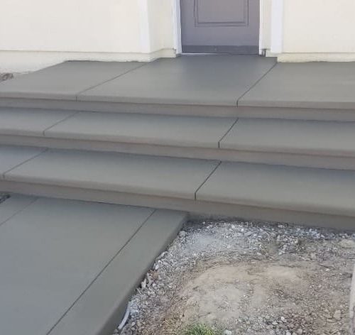 Great set of concrete steps leading to the front of an Oakland home