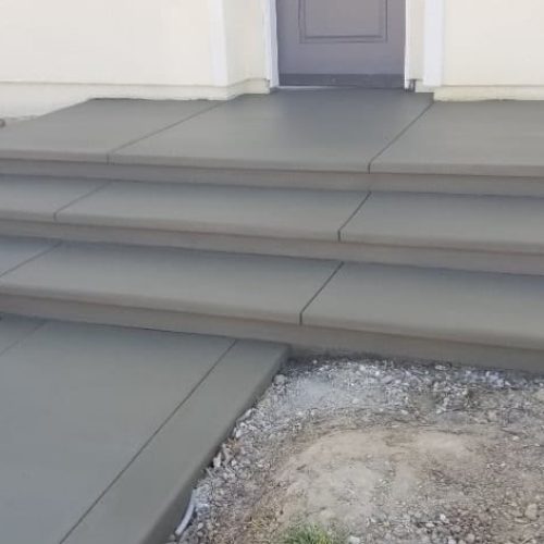 Great set of concrete steps leading to the front of an Oakland home